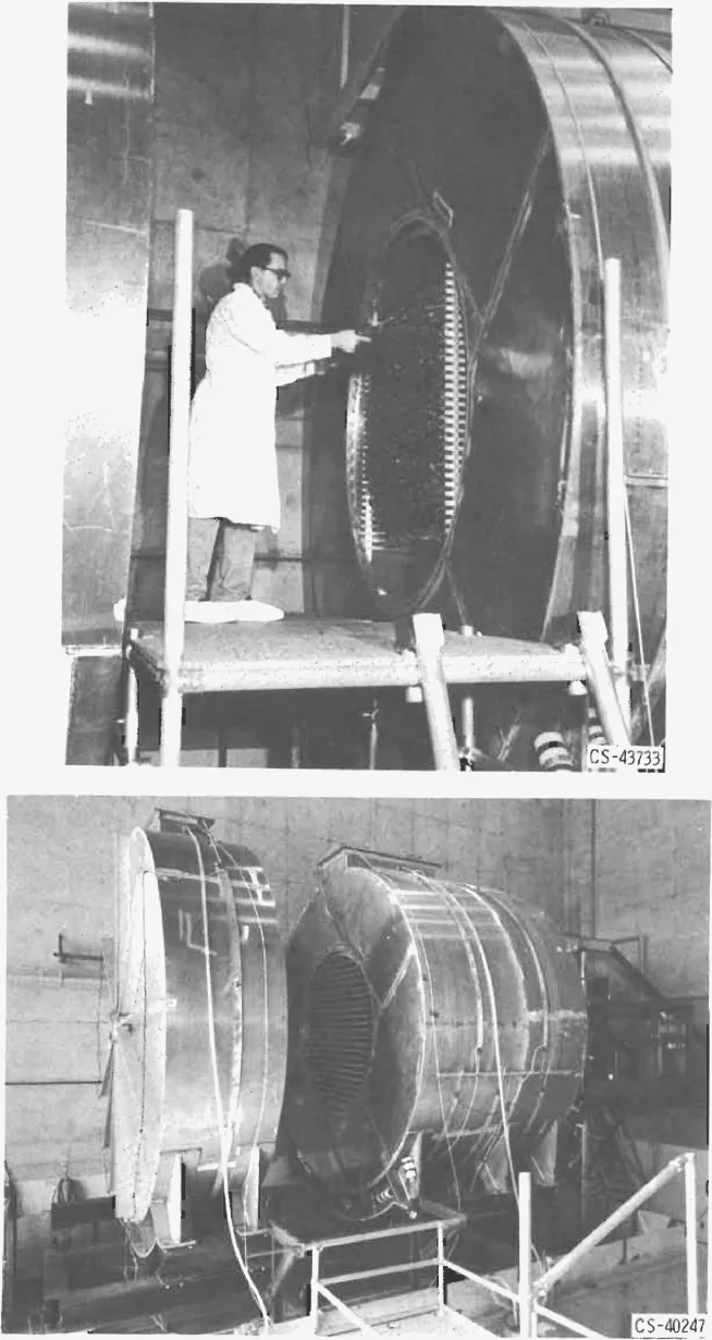 Two photographs: a technician on a platform loading a tray into a large circular cavity, and the two halves of a large cylindrical reflector tank